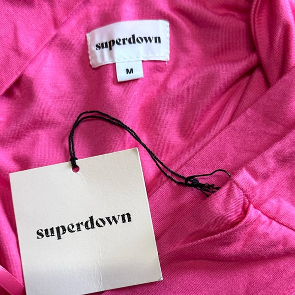 NWT REVOLVE Gene Cross Front Bodysuit in Pink
superdown 🔥Hot Item🔥 on preorder - Picture 9 of 9